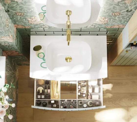 Badkamerinspiratie met groene meubels in speciale kleur met zijden van natuurlijk eikenhout, elegante groeven, werkblad met ovale opzetwastafel, ovale spiegel en bloemenbehang geeft een sierlijke, retro uitstraling.