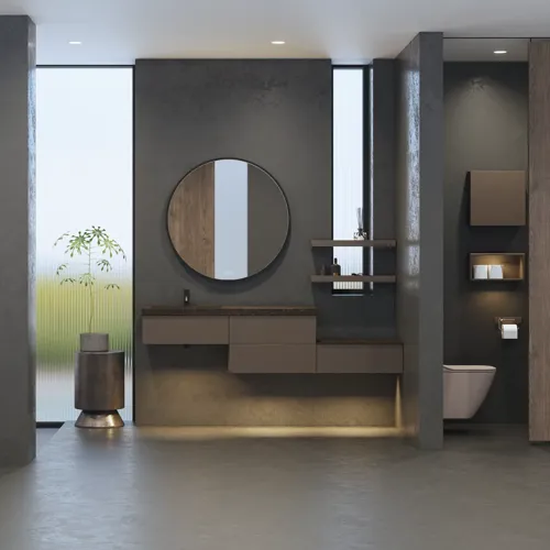 Stijlvolle en ruime badkamer inspiratie met grote ronde spiegel met zwarte lijst, donkere stenen wastafel, gekleurd toilet, bovenkast en open plank in een verfijnd en ingetogen ontwerp