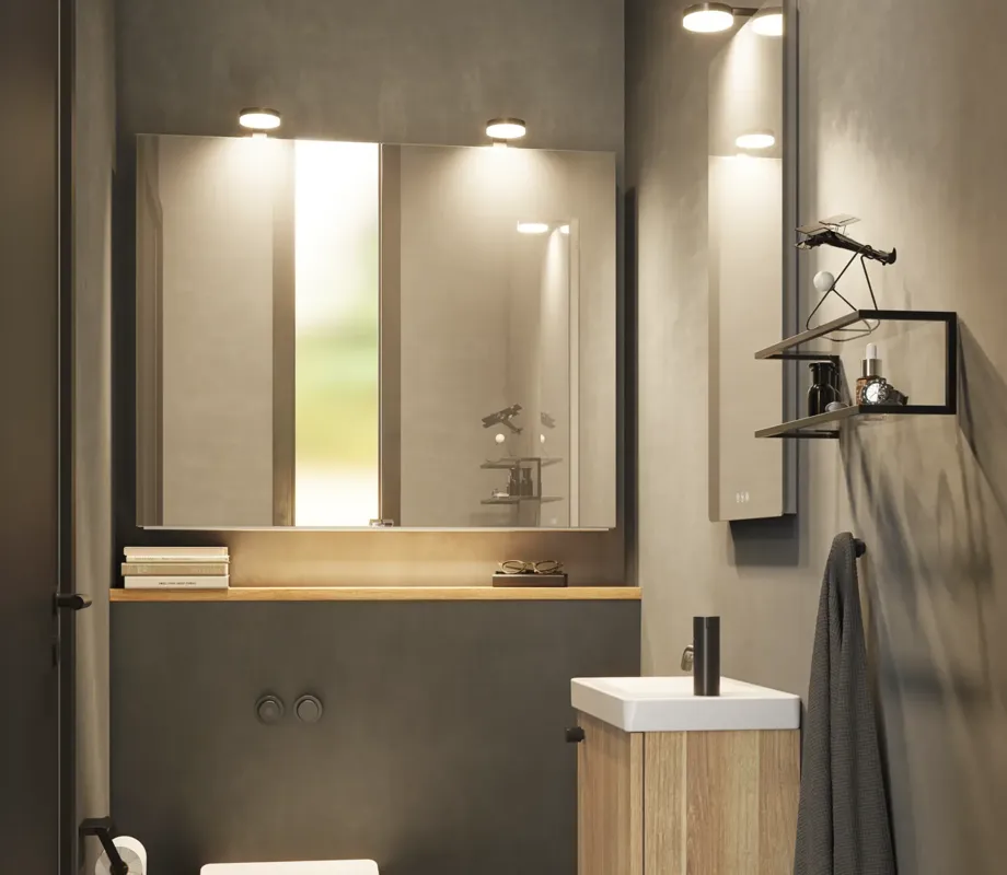 Stijlvolle en minimalistische badkamerinspiratie met micro wastafel en klein wastafelmeubel, vierkante spiegel met afgeronde hoeken en lamp, en elegant spiegelkast.