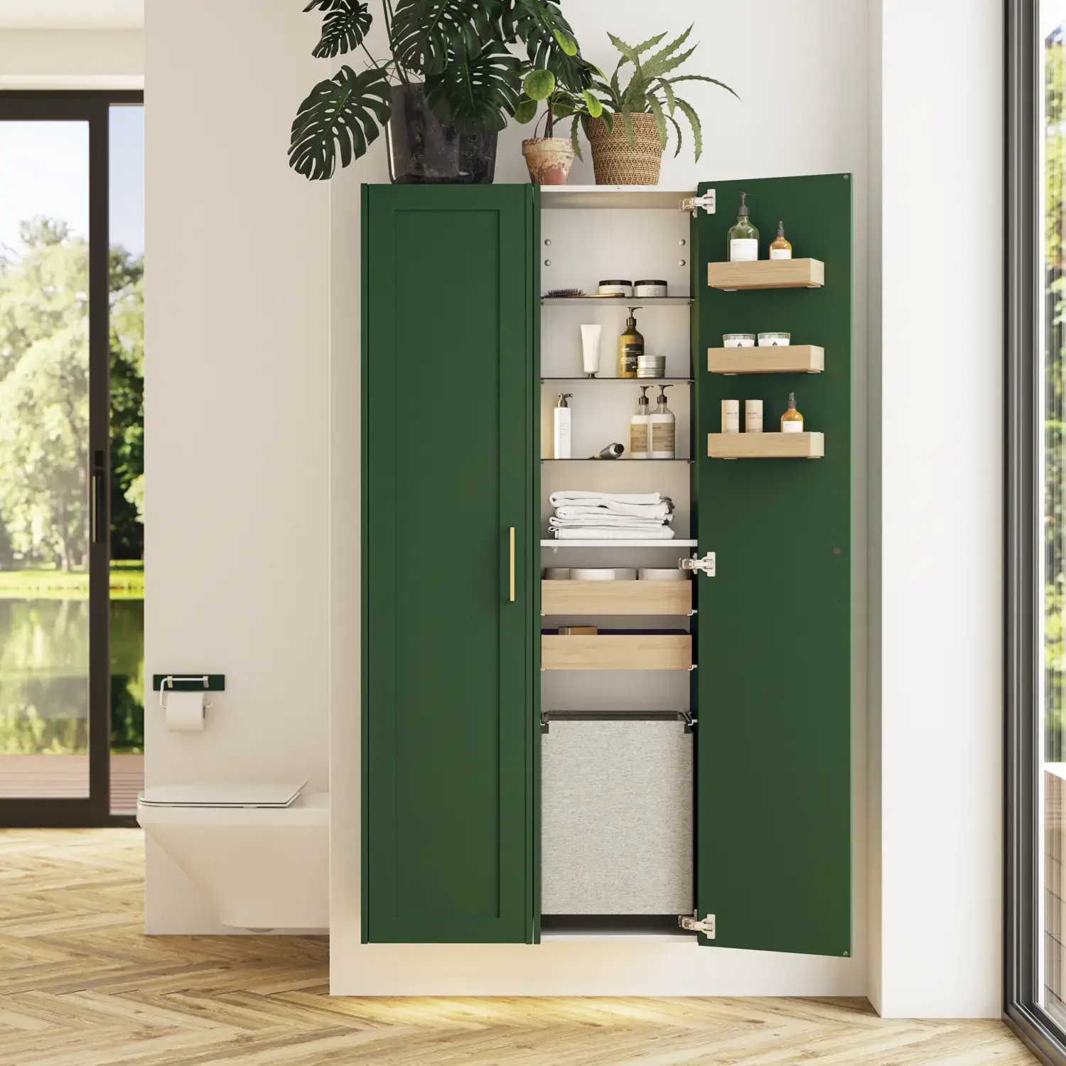 Grote badkamer in groene kleurstelling met wastafelmeubel, ovale spiegel met gouden rand en mooie deuren met