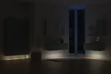 Grote badkamerinspiratie in Scandinavische stijl met badkamermeubels in lichtblauwe kleur en houten aanrechtblad met elegante opzetwastafel, visgraat houten vloer creëert een lichte en klassieke stijl