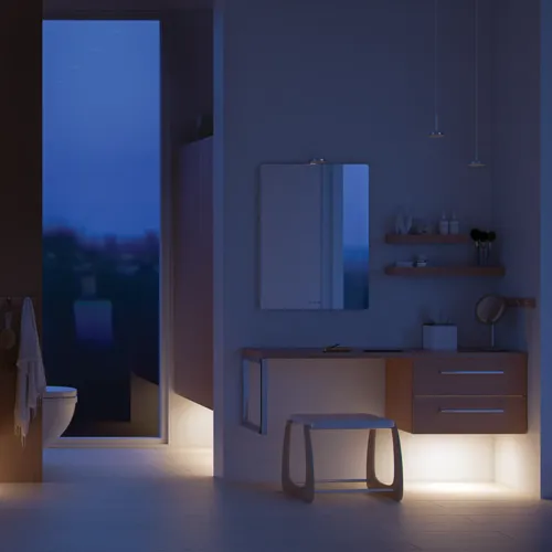 Moderne badkamer in Noordse stijl met licht hout, elegante verlichting, spiegelkastmuur en stijlvolle inrichting die een warme en uitnodigende sfeer creëert.