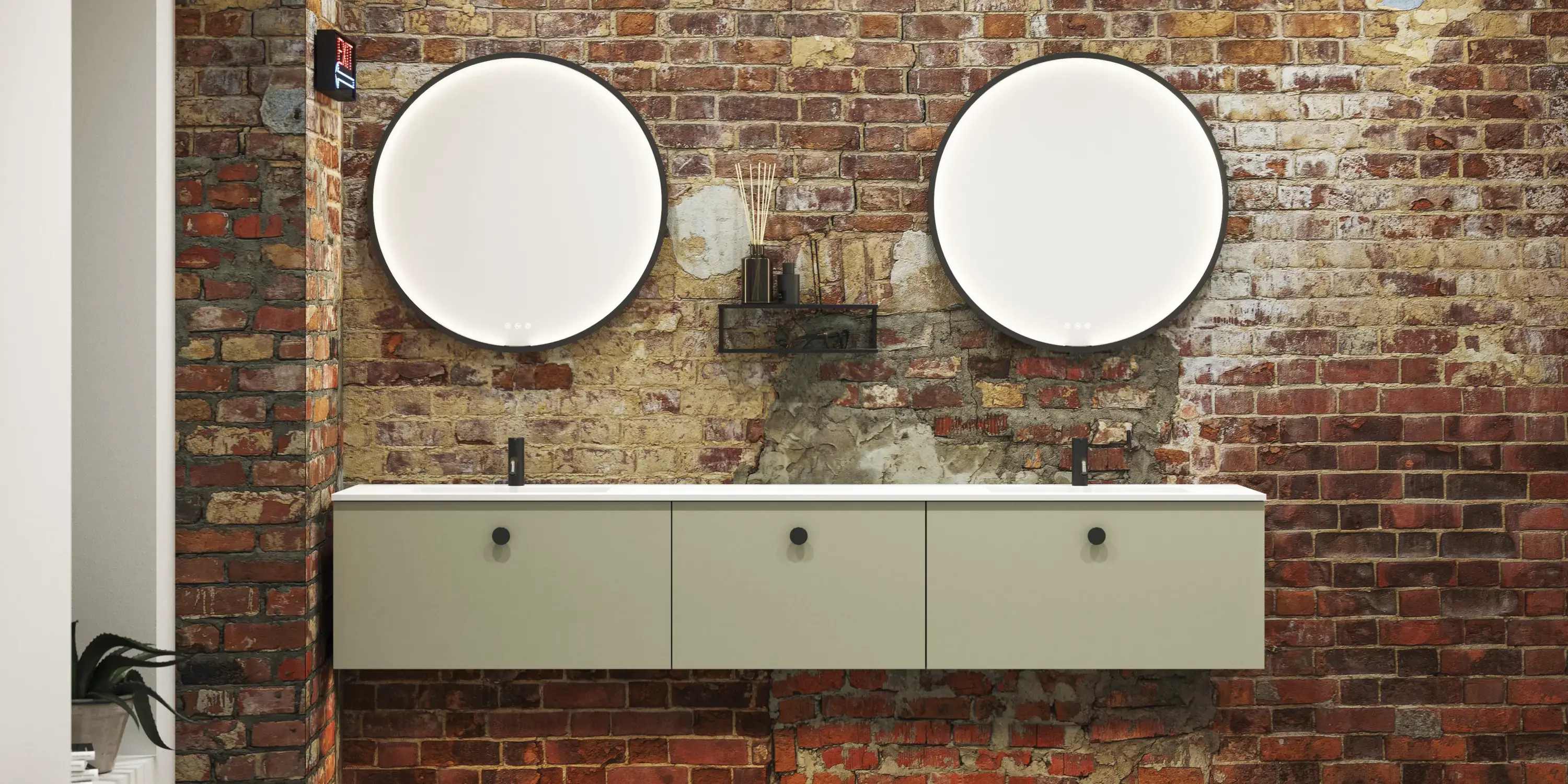 Moderne stoere badkamer in urban stijl. Mooie wastafelkasten en ronde spiegels met zwarte randen